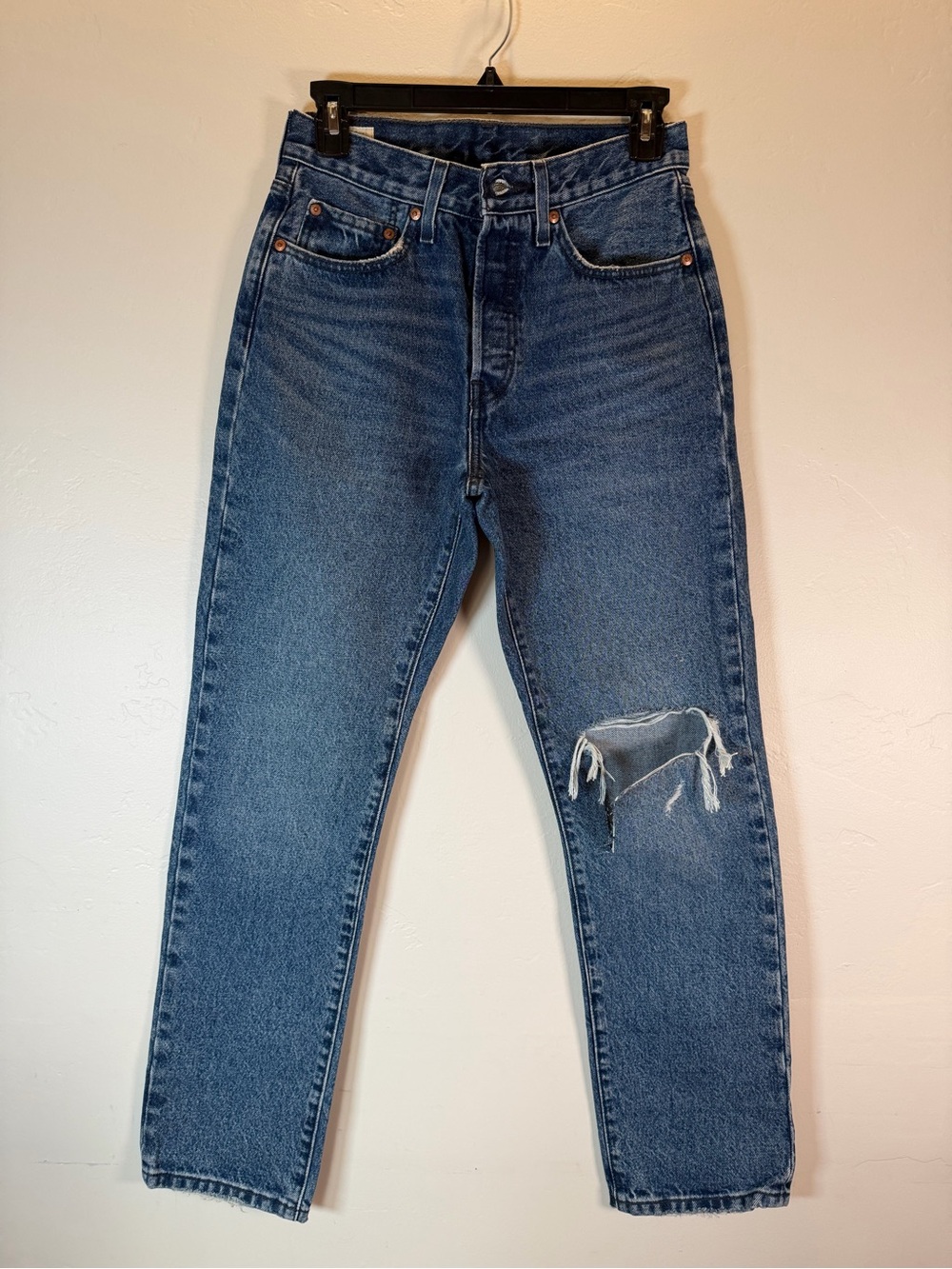 Levi's Women's Jeans in Mid Blue with Knee Distress